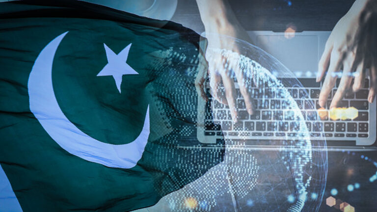 A man from the Pakistan's Hindu community waves a national flag during a rally expressing solidarity with the people of Kashmir, on Pakistan's 72nd Independence Day in Peshawar